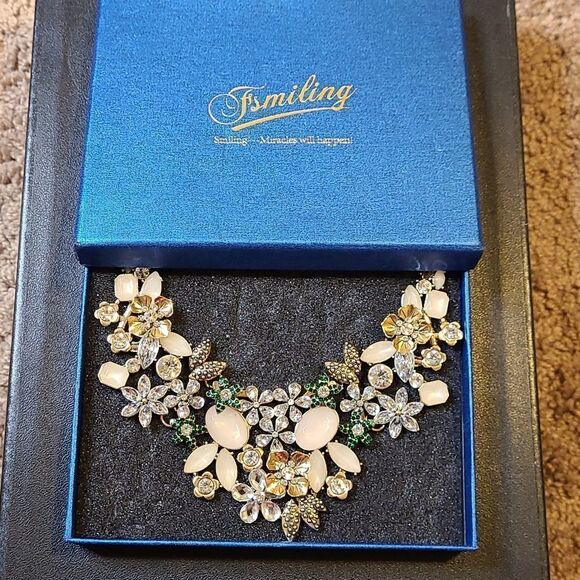 FSmiling Jewelry - Statement FSmiling Floral Necklace in vintage Gold with rhinestone accents.